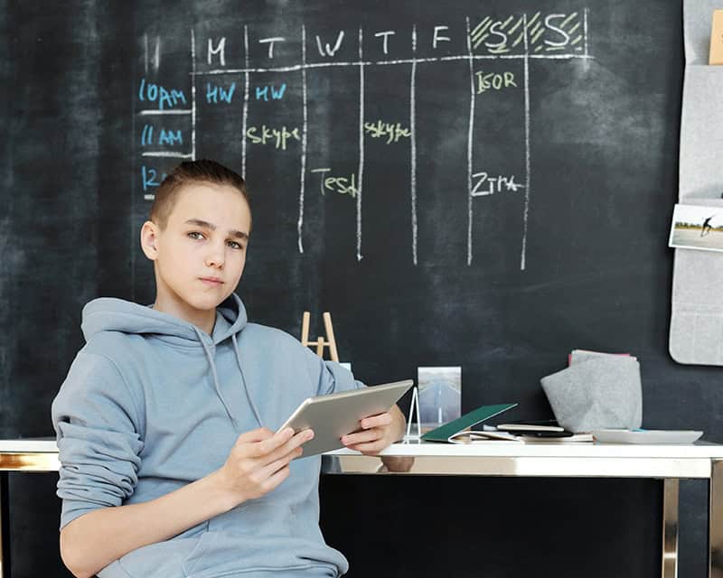 Teen boy getting organised